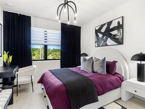 This bedroom also has a dedicate workspace for when duty calls.