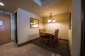  Intimate dining area with soft lighting, perfect for enjoying meals in a cozy setting.