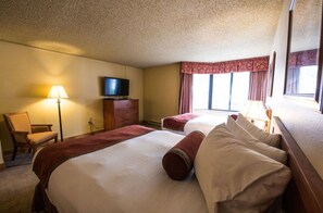 Cozy bedroom with soft lighting and a comfortable bed for a peaceful night's rest.