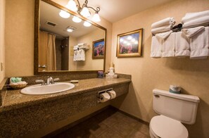 Elegant bathroom with modern fixtures and a luxurious vanity.