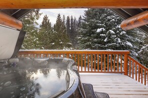 Soak in the hot tub on the rear deck, the ultimate relaxation spot