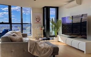 Luxury lounge with large 85" screen tv