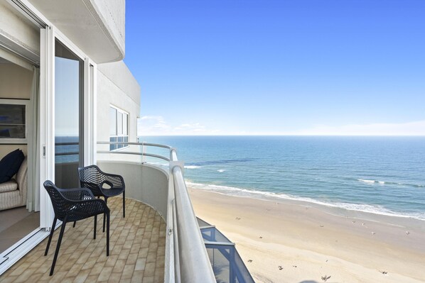 Enjoy your morning coffee in this spacious balcony overlooking the ocean