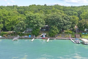 Surrounded by nature's beauty, this lakefront home offers the perfect blend of seclusion and comfort. Spend your days on the dock or exploring the crystal-clear waters of the lake .
