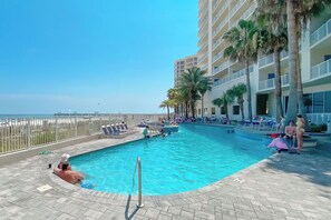 Outdoor pool with Sun Loungers and Partially Shaded Area