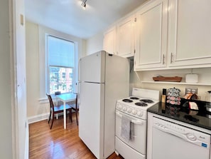 Whip up your favorite meals in this cozy, fully-equipped kitchen, set within a charming Old Town Alexandria apartment that's a stroll away from local food markets and culinary delights.