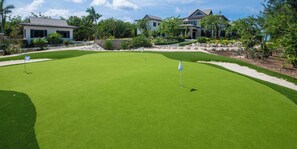 Work on your golf game on the villa's private practice green with multiple tee boxes and sand traps. Wedges, putters, and balls provided. 