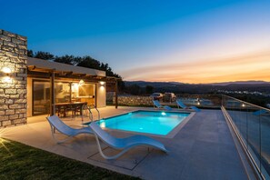 A villa with a view and a pool to match