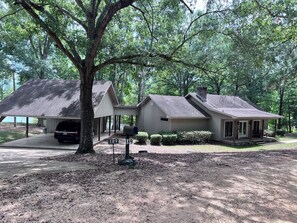 Exterior of home and covered carport 