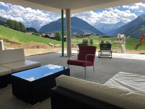 Lounge and sun loungers with a view.
