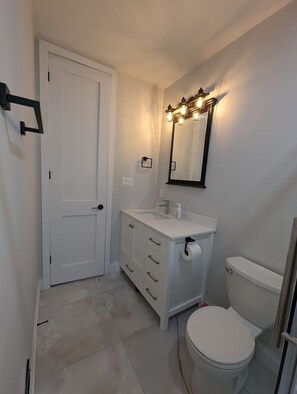 Start your day fresh in our stylish and modern bathroom.  Clean lines, contemporary fixtures, and a soothing ambiance create the perfect space to refresh and rejuvenate