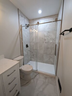 Start your day fresh in our stylish and modern bathroom.  Clean lines, contemporary fixtures, and a soothing ambiance create the perfect space to refresh and rejuvenate
