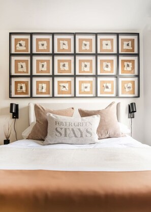 This unique wall art featuring vintage Metropolitan Line train timetables adds a touch of nostalgia and local flair to the room. It’s a quirky reminder of London’s rich transport history. Who knew art could be so practical?