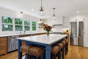 Chef's kitchen with island seating for 6