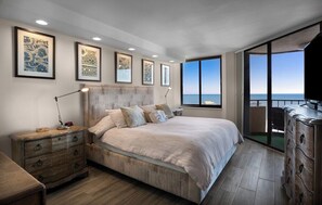 Wake up to breathtaking ocean front views in this beautifully designed master bedroom. Featuring a plush king-sized bed, stylish decor, and direct balcony access for the perfect beachfront escape in Myrtle Beach.