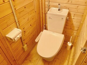 A toilet with a washlet.