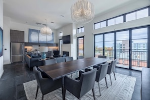 Open floor plan living, dining, and kitchen.
