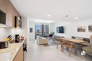 Take the elevator to the 24th floor and step into a haven of comfort and style