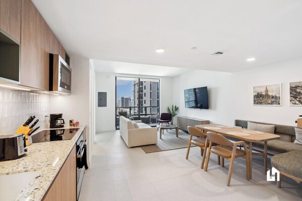 Take the elevator to the 24th floor and step into a haven of comfort and style