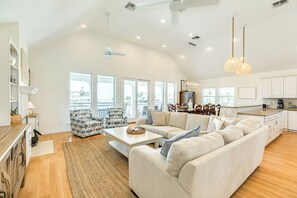 Open living area with vaulted ceilings