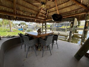 Tiki Hut with TV on canal