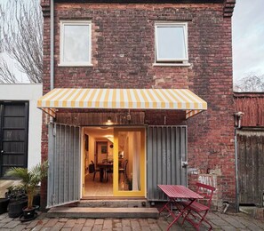 Feel as though you’re stepping into a storybook with this charming entryway. 