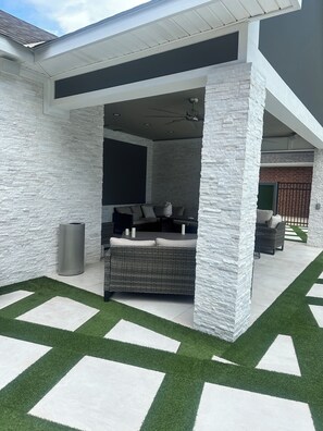 Entertainment area beside pool