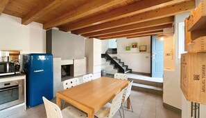 Lovely dining room with access to the upper floor