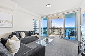 Cozy living area is right next to the balcony overlooking the river