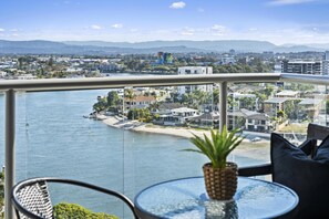 Enjoy your morning coffee in our spacious balcony overlooking the river/city