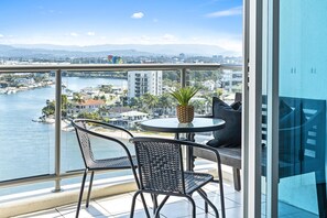 Enjoy your morning coffee in our spacious balcony overlooking the river/city