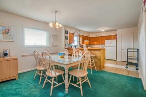 Open floor plan with dining area off from the living room.