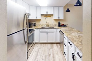 Kitchen | Single-Story Condo | Free WiFi | Window A/C Unit | Baseboard Heating