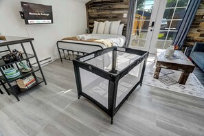 This cozy studio includes a convenient pack-n-play for your little adventurer, ensuring a comfortable stay for the whole family.