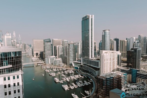 Enjoy stunning views of the Dubai Marina skyline from your apartment, offering a peaceful and luxurious stay.