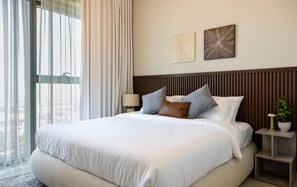 Indulge in luxurious comfort with a plush king-size bed, perfect for a restful night’s sleep.