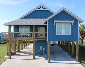 Front View of House & Parking Access under House 