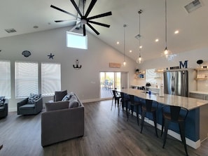 Living Room, Kitchen & Sliding Glass Door to Back Patio