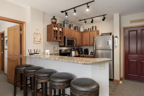 Indoors, Furniture, Kitchen, Refrigerator, Microwave