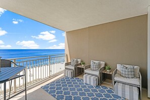 Private Balcony, Accessible via Living Area and Primary Bedroom