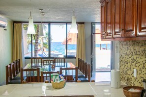 Kitchen Looking Out to Pool and Ocean