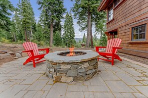 Exterior: Peaceful backyard, fire pit, forest views