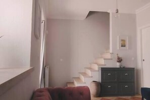 Stairs leading up to bedrooms