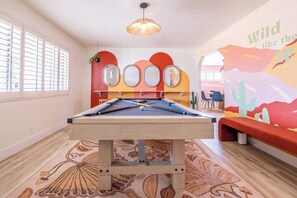 Challenge your friends to a game in our stylish, sun-soaked billiards room!