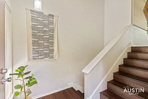 Welcome to our home! Walk down to the main floor, and up to floor 2