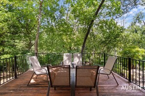 Deck off of the living and dining room with seating for all