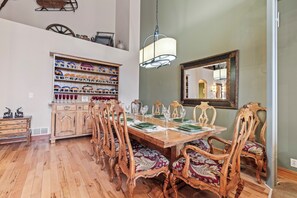 Cove Retreat offers seating a dining table with seating for 8 guests.