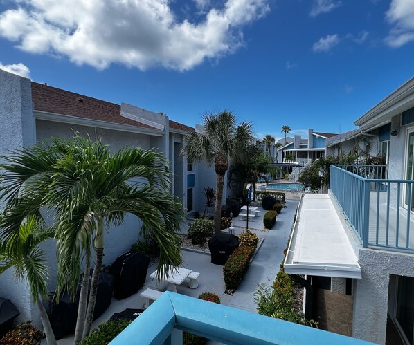View of the pool from the front entrance/ balcony. - View of the pool from the front entrance/ balcony.