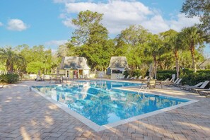 Retreat to the communal pool for an afternoon of relaxation