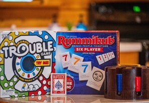 Rainy day or family game night? We've got you covered with classic games like Trouble and Rummikub for endless fun!